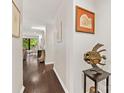 Inviting hallway showcases hardwood floors and stylish decor leading to the living area at 2719 Selwyn Ave # 20, Charlotte, NC 28209