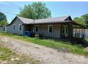 Exterior of house with covered front porch and gravel driveway at 4194 Buffalo Shoals Rd, Maiden, NC 28650