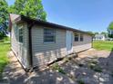Exterior view of house with siding and a concrete patio at 4194 Buffalo Shoals Rd, Maiden, NC 28650