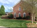 Lovely brick home with lush green lawn and well-manicured landscaping at 1142 Ardwyck Pl # 5, Rock Hill, SC 29730