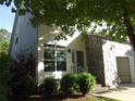 Charming home featuring stone accents, attached garage, and landscaped front yard at 1502 Mulberry Ridge Dr # 1, Newton, NC 28658