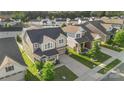 An aerial view of a charming two-story home in a friendly neighborhood at 16134 Kelby Cv, Charlotte, NC 28278