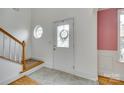 Foyer featuring tile floors, a decorative window and stairs at 1835 Montague Rd, Clover, SC 29710