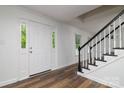 Inviting foyer with hardwood floors, staircase, and plenty of natural light at 1920 Williford Woods Ln # 5, Rock Hill, SC 29730