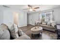 Comfortable living room features hardwood floors, neutral walls, and cozy seating, creating an inviting space at 509 Ellingsworth Ln, Charlotte, NC 28214