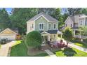 An aerial view of the home and its surrounding neighborhood including the detached garage at 7814 Knox Ridge Rd, Huntersville, NC 28078