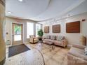 The well-appointed lobby provides a relaxed atmosphere with ample seating, decorative accents, and convenient exit access at 1000 E Woodlawn Rd # 402, Charlotte, NC 28209