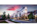 Charming modern apartment complex with appealing architectural style at dusk at 3630 N Davidson St # 3301, Charlotte, NC 28205