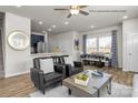 Inviting living area featuring modern decor, an open layout to the dining area, and ample natural light at 5201 Shasta St # 5201, Gastonia, NC 28052