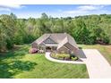 Expansive aerial view of a beautiful estate featuring a well-maintained lawn and an extended driveway at 730 Oak Ridge Farms Cir # 14, Newton, NC 28658