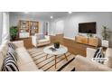Bright living room with stylish furniture, hardwood floors, and modern decor at 141 Edenvale Rd, Rock Hill, SC 29730