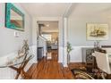 Elegant foyer featuring hardwood floors, stylish decor, and an open view into the living spaces at 2772 Sherrills Stream Dr, Sherrills Ford, NC 28673