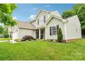 Charming two-story home with well-manicured lawn and tasteful landscaping at 3032 Kilbeggan Dr, Clover, SC 29710