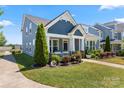 Well-maintained home featuring a beautiful lawn, manicured landscaping, and inviting curb appeal at 3588 County Down Ave, Kannapolis, NC 28081