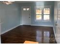 Inviting living room featuring gleaming hardwood floors and natural light at 523 Franklin Ave, Charlotte, NC 28206