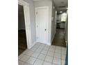 Welcoming foyer with tile flooring and an open view into the kitchen with stainless steel appliances at 5637 Hedgecrest Pl, Charlotte, NC 28269