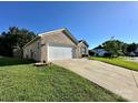 Lovely home with a two-car garage, a well-kept lawn and easy driveway access at 8551 Appledale Dr, Charlotte, NC 28262