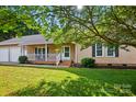 Lovely single-story home with a covered porch and fresh landscaping at 2379 Whitley Rd, Fort Mill, SC 29708