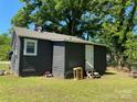 Side view of a single-story home with a white back door at 358 Orr Dr, Rock Hill, SC 29730
