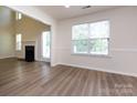 Sunlit dining room is adjacent to the living room, offering great natural light and convenient access to the outdoors at 521 Ellingsworth Ln, Charlotte, NC 28214