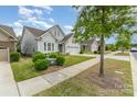 Well-maintained home along a tree-lined street with sidewalks and manicured lawns at 8210 Festival Way, Charlotte, NC 28215