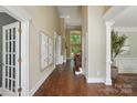 Elegant foyer features hardwood floors, high ceilings, and stylish decor at 16216 Woolwine Rd, Charlotte, NC 28278