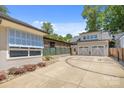 Spacious three-car garage with basketball hoop, and a fenced-in yard at 4147 Chelmsford Rd, Charlotte, NC 28211