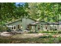 Spacious backyard with a patio, perfect for outdoor entertaining and relaxation at 7357 Elwood Dr, Charlotte, NC 28227