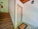 Welcoming entrance featuring a staircase and a front door with a welcome mat at 1052 Churchill Downs Ct # I, Charlotte, NC 28211