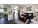 Open floor plan featuring a view from the living room into the charming kitchen at 109 Hunter Ct, Oakboro, NC 28129