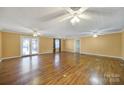 Spacious living room with hardwood floors and plenty of natural light at 1723 Baskins Hill Rd, Heath Springs, SC 29058