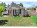 Charming single-Gathering home with a well-maintained yard and welcoming facade at 2126 Downing St, Charlotte, NC 28205