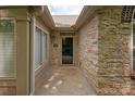 Inviting front entrance with stone facade, house number, and well-maintained walkway at 2704 Polo Club Blvd, Matthews, NC 28105