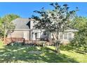 Spacious backyard featuring a wooden deck and lush greenery, perfect for outdoor living at 944 Evian Ln, Matthews, NC 28015
