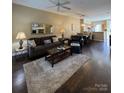 Inviting living room with hardwood floors, neutral color scheme, and an open layout perfect for entertaining at 1049 Park West Dr, Charlotte, NC 28209