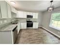 Well-lit kitchen featuring stainless steel appliances, granite countertops, and modern cabinetry at 1252 Shenandoah Cir, Rock Hill, SC 29730