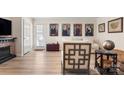 Inviting living room featuring a fireplace and hardwood floors at 15746 Marvin Rd, Charlotte, NC 28277