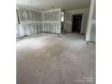 Unfinished living room offering a blank canvas for customization and design at 411 Woodlawn Ave, Gastonia, NC 28052