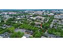 Lovely aerial view of condo surrounded by mature trees in an urban neighborhood at 526 N Davidson St, Charlotte, NC 28202
