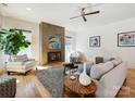 Inviting living room with a modern fireplace, stylish furniture, and abundant natural light creating a cozy atmosphere at 1009 Belmont Ave, Charlotte, NC 28205