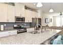 Well-appointed kitchen with granite countertops, stainless steel appliances, and ample cabinet space for storage at 11741 Blessington Rd, Huntersville, NC 28078