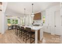 Bright, modern kitchen featuring a large center island, stainless steel appliances, and an open layout at 1829 Union St, Charlotte, NC 28205