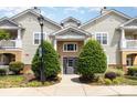 Close up of condominium entrance with well-maintained landscaping and visible signage at 11707 Ridgeway Park Dr, Charlotte, NC 28277