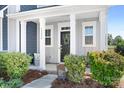 Inviting front porch with charming decor, offering a cozy and welcoming entrance to the home at 13359 Caite Ridge Rd, Davidson, NC 28036