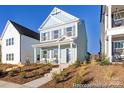 Beautiful two-story home with a welcoming front porch and professionally landscaped front yard at 1359 Russell St, Rock Hill, SC 29730