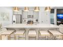 Modern kitchen featuring a large quartz island with seating and stainless steel appliances at 1359 Russell St, Rock Hill, SC 29730