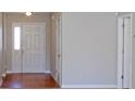 Welcoming entryway with a bright front door, hardwood floors, and a neutral color scheme at 1367 Springview Ct, Rock Hill, SC 29732