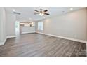 Spacious living room with hardwood floors, recessed lighting, and an open view of the kitchen at 2502-2504 Glendale Ave, Kannapolis, NC 28081