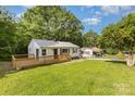 A charming house with a well-manicured lawn and a lovely wooden deck, perfect for enjoying the outdoors at 2603 Mary Ave, Gastonia, NC 28052