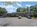 Charming two-story townhouse with ample parking in front at 3131 Heathstead Pl, Charlotte, NC 28210